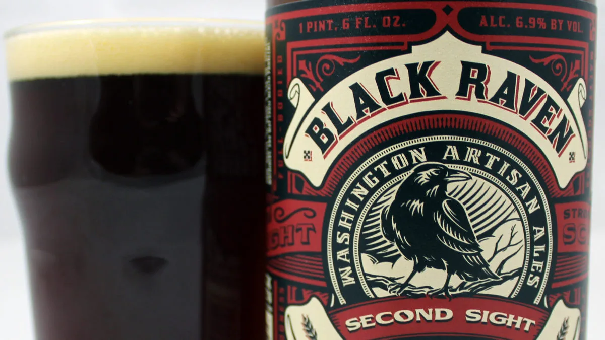 Second Sight Glass and Bottle Bottle label for Second Sight in front of a glass of poured beer